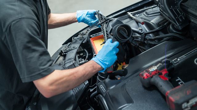 Mechanic fixing a car